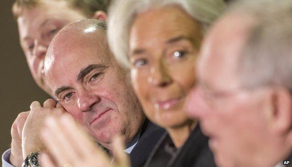 Spain's Economy Minister Luis de Guindos (left) and International Monetary Fund Managing Director Christine Lagarde (centre), with German Finance Minister Wolfgang Schauble