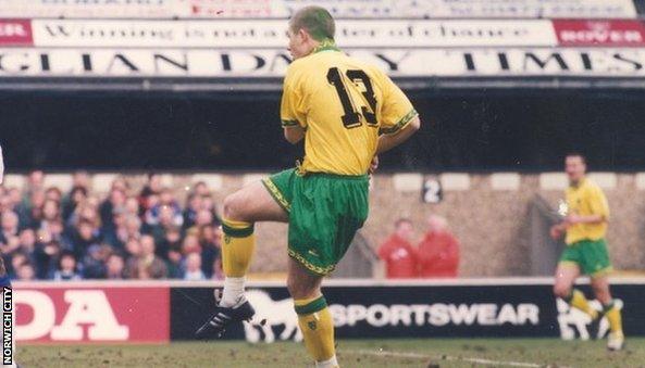 Jamie Cureton scores for Norwich with green hair