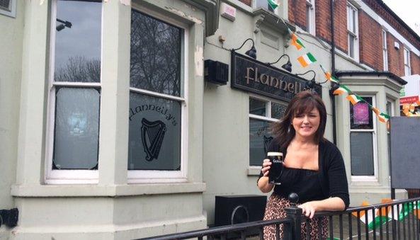 Liz Flannelly outside her Coventry pub