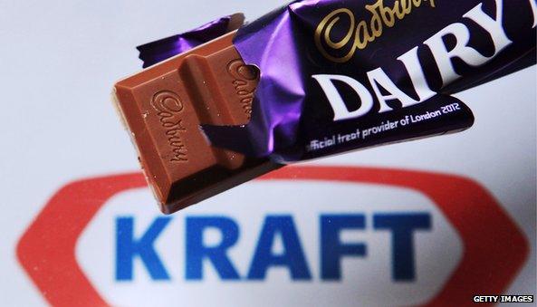 Photo illustration of a Cadbury chocolate bar against a Kraft logo