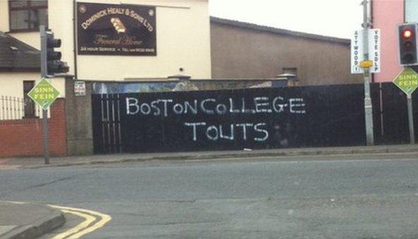 Graffiti referencing Boston College was daubed on a wall in west Belfast