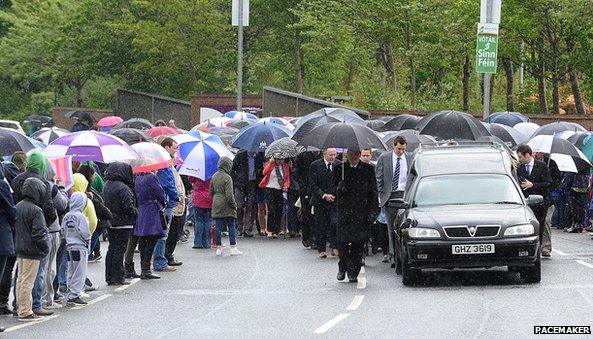 People lined the route of the procession
