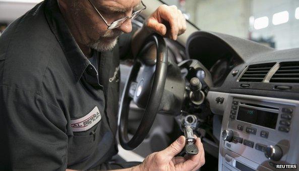 Technician working on Cobalt ignition