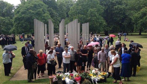 Mourners and visitors lay flowers at the 7/7 memorial in Hyde Park