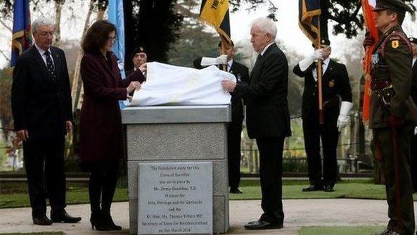 Theresa Villiers and Irish Arts Minister Jimmy Deenihan unveiled the memorial