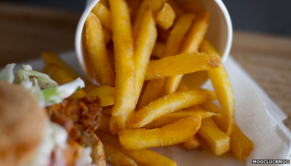 French fries and fried chicken sandwich at moo cluck moo