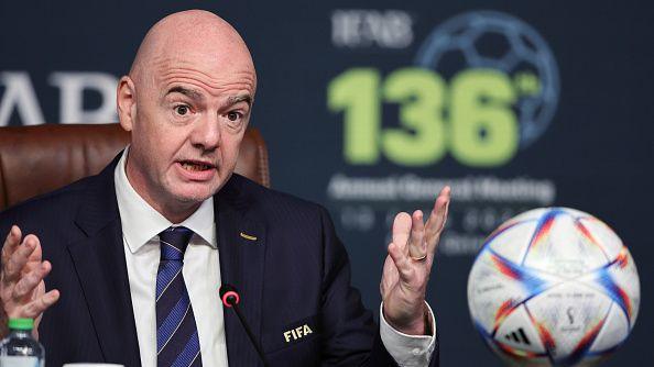 Gianni Infantino holds his hands up