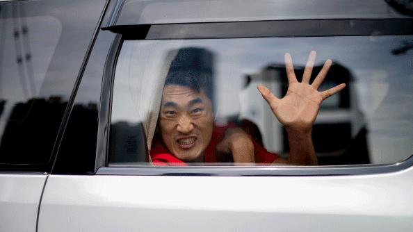 Chinese man in a taxi