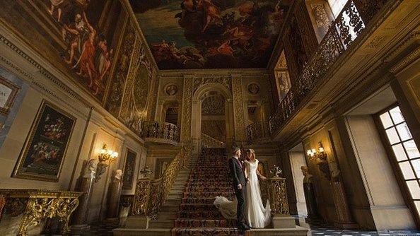 Married couple at stately home