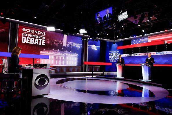 Vice-presidential candidates JD Vance (left) and Tim Walz on the debate stage