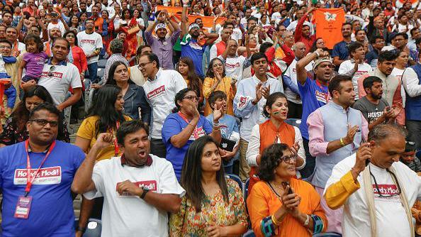 Supporters of India's prime minister, Narendra Modi cheer during the Howdy Modi event at NRG Stadium day, Sept. 22, 2019, in Houston. 