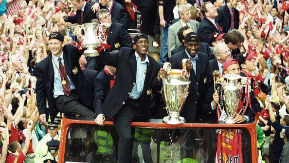 Manchester United celebrate winning the Treble in Manchester during an open-top bus parade