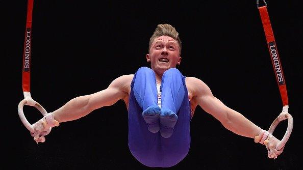 GB's Nile Wilson competes on the rings in the Men's Team final at World Gymnastics Championship in Glasgow.