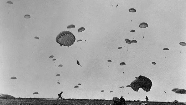 paratroopers parachuting into enemy territory