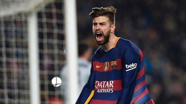 Barcelona defender Gerard Pique celebrates scoring against Athletic Bilbao