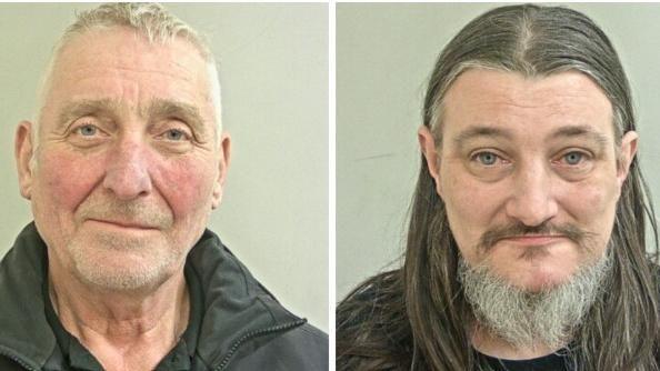 Two mugshots side by side of two middle-aged men. The one on the left has short hair and stubble while the one on the right has long hair and a beard. 