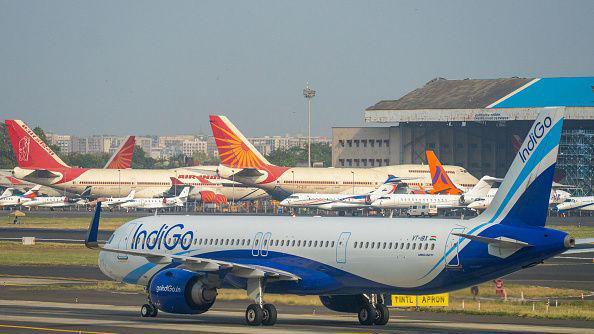 An IndiGo aircraft taxis on the runway after landing at Chhatrapati Shivaji Maharaj International Airport in Mumbai