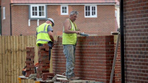 builders on new housing estate