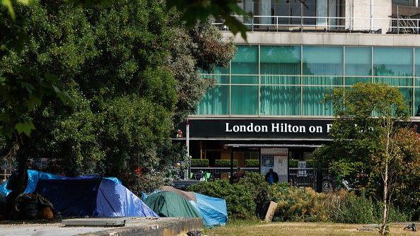 An encampment of tents outside the London Hilton at Park Lane.