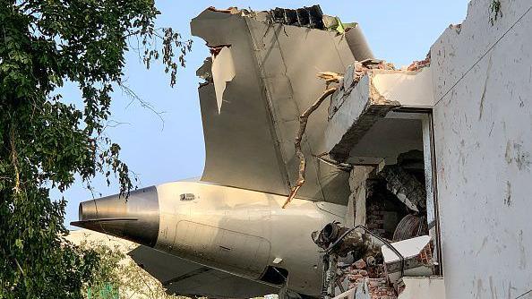 The back of Air India flight 171 is pictured at the site after it crashed in a residential area near the airport in Ahmedabad