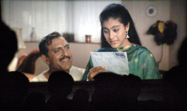  Silhouette of movie goers watching the popular Hindi film Dilwale Dulhania Le Jayenge on the big screen