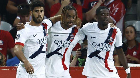 PSG players celebrate scoring against Lille