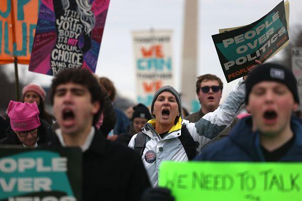 Protesters yell during the People's March