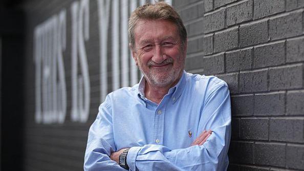 Screenwriter Steven Knight poses during a photocall to promote the dance theatre adaptation 'Peaky Blinders: The Redemption Of Thomas Shelby,' on June 10, 2025 in Birmingham, England. 