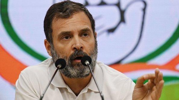 Congress party leader Rahul Gandhi gestures as he speaks during a press conference in New Delhi on March 25, 2023, after being disqualified as a member of parliament.