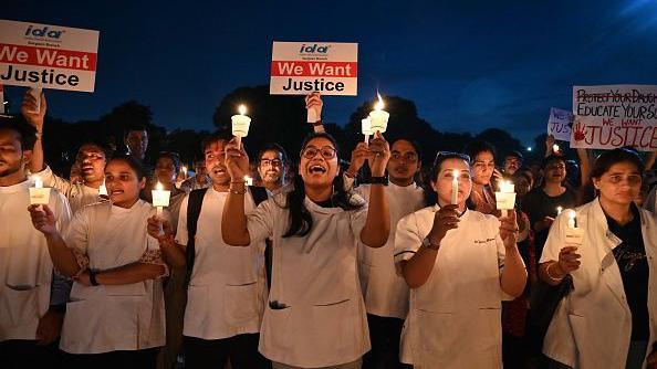 Around 500 people participate in candlelight vigil and peaceful protest over the rape and murder of a doctor, on August 18, 2024 in Gurugram, India