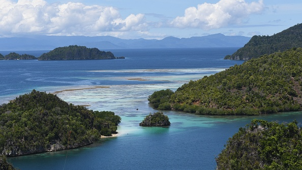 Blue sea surrounding archipelago of green islands