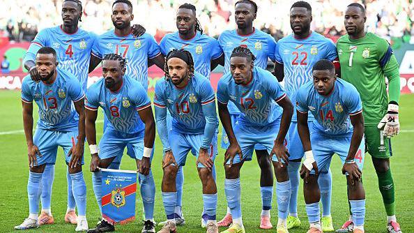 Democratic Republic of Congo's players dressed in blue and the goalkeeper in green pose for a picture during an Africa Cup of Nations match at the Prince Moulay Hassan Stadium in Morocco