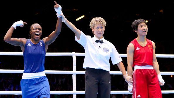 Nicola Adams is announced winner against Ren Cancan during the Women's Fly Boxing final.