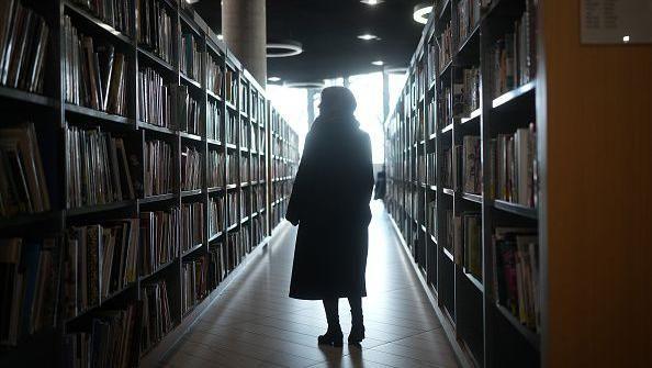 Woman in a library