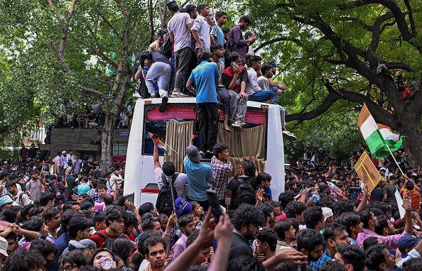 Protesters gather as they take part in a demonstration organised by the Cockroach Janta Party (CJP) at Jantar Mantar during the opening day of Parliament's Monsoon Session on July 20, 2026 in New Delhi,