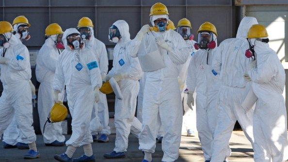 Tepco workers at the Fukushima nuclear power plant on 12 February 2012