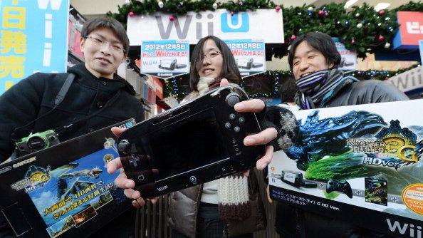 Shopper shows off her Wii-U purchase