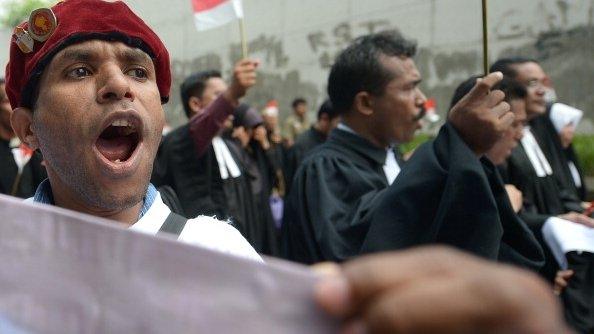 An Indonesian protester shouts slogans as religous leaders protest against Indonesian government failures to guarantee freedom of religion in Jakarta on 8 April 2013