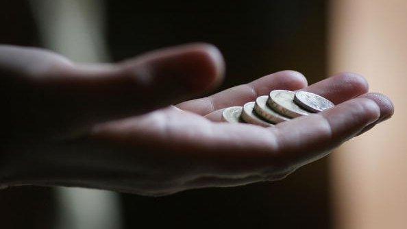 Coins in a hand