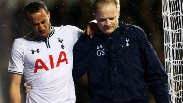 Andros Townsend (left) goes off injured