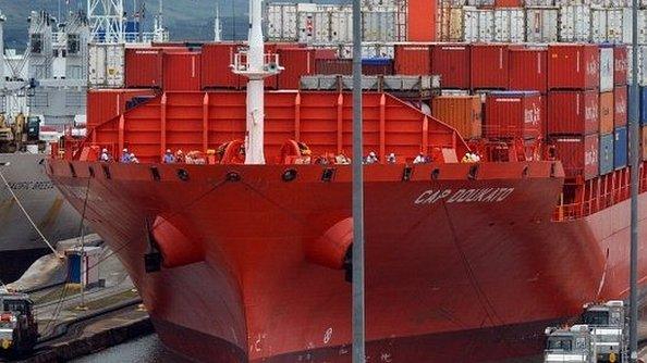 A ship passes through a lock at the Panama Canal