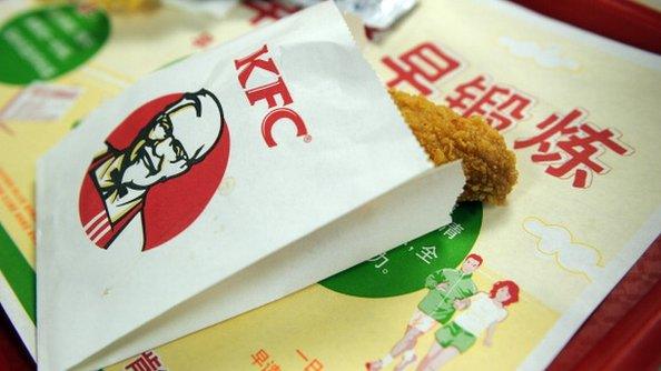 A KFC bag containing a chicken wing