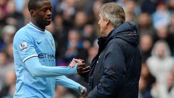 Yaya Toure (left) with Manuel Pellegrini