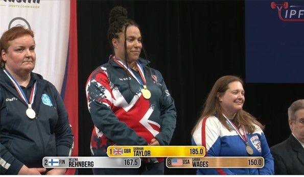 Siobhan Taylor on the top step of the podium, having been given her gold medal