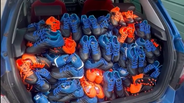 A car boot full of football boots