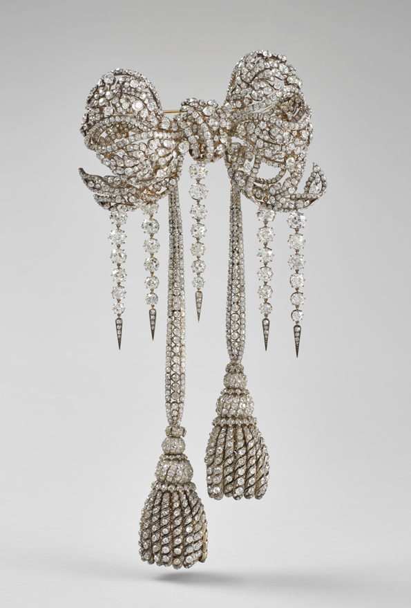 A silver jewel-encrusted bow stolen from the Louvre