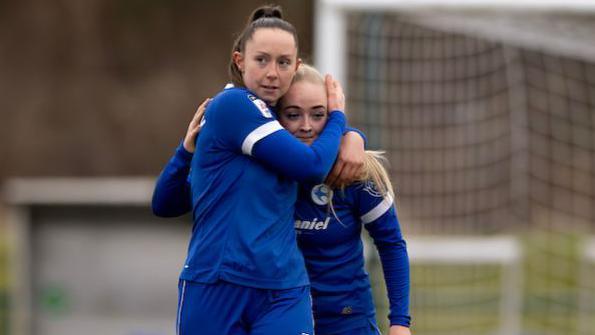 Cardiff City's Lily Billingham (R) celebrates scoring against Swansea City