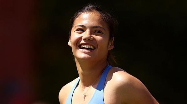 Emma Raducanu smiles after her victory