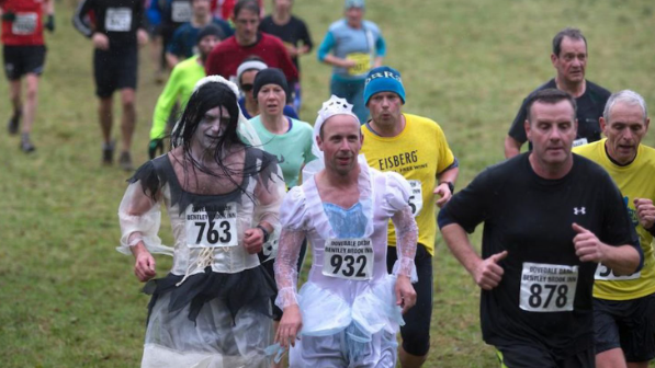 Runners in fancy dress in the Dovedale Dash in Derbyshire