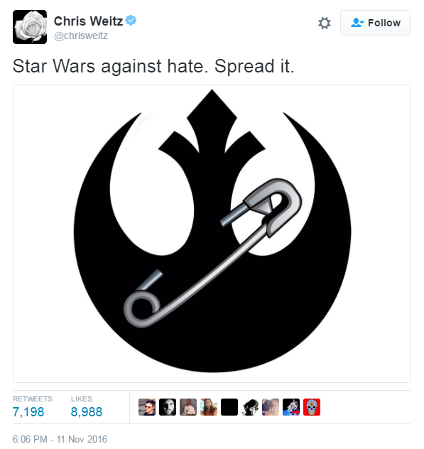 The logo of the rebel alliance with a safety pin through it